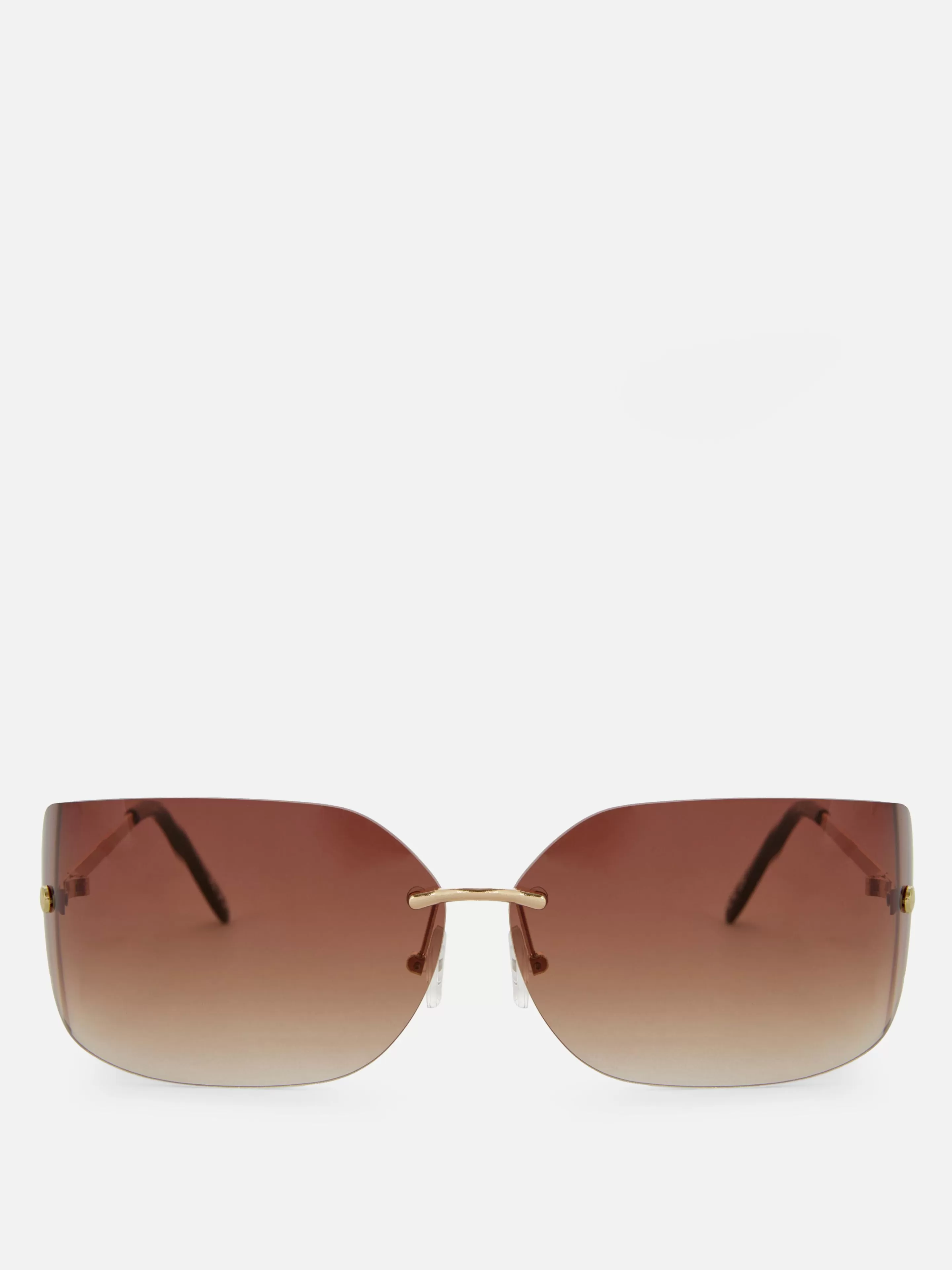 Primark Sonnenbrillen | Randlose, Gebogene „Rita Ora“ Sonnenbrille Braun